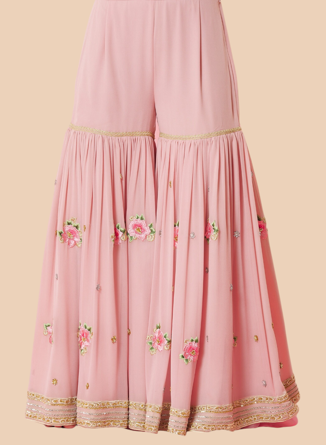 Stunning pink embroidered lehenga suit with a floral silk top, paired with a matching dupatta and georgette sharara.