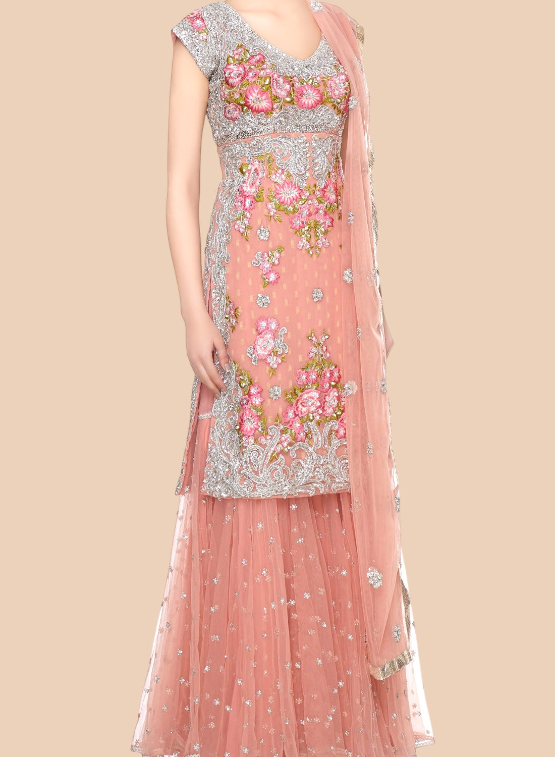 Beautiful rose net Sharara set adorned with floral embroidery and silver scrolls, paired with a delicate dupatta for elegance.