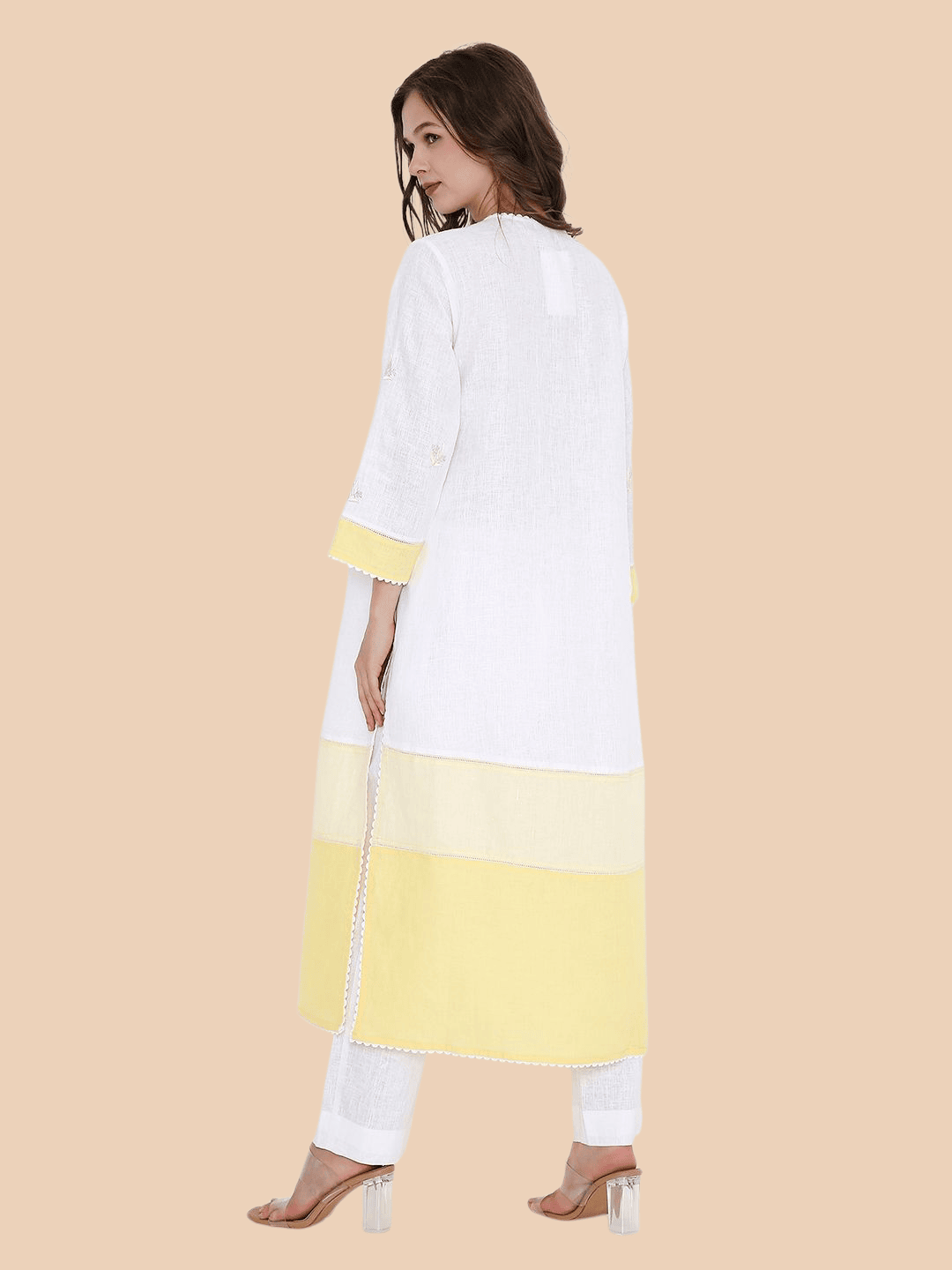 Back view showing straight cut and tiered hem of kurta