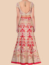 Long dress with red and white floral pattern on a beige background