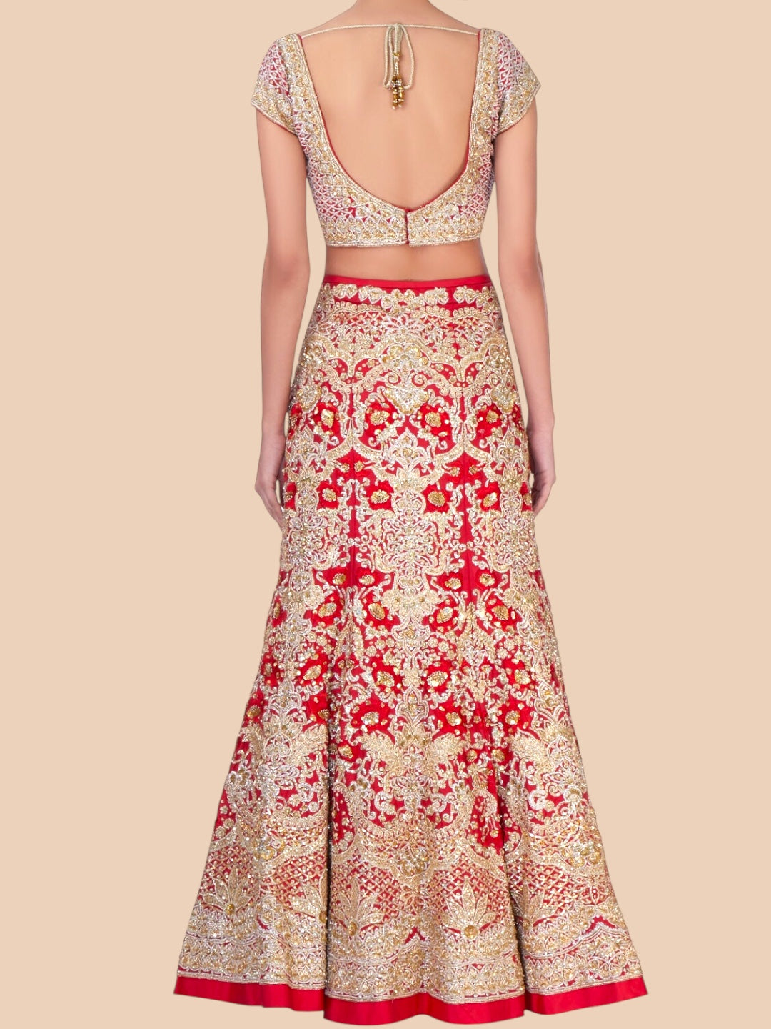 Long dress with red and white floral pattern on a beige background