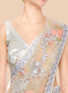 Saree with floral embroidery on a neutral background