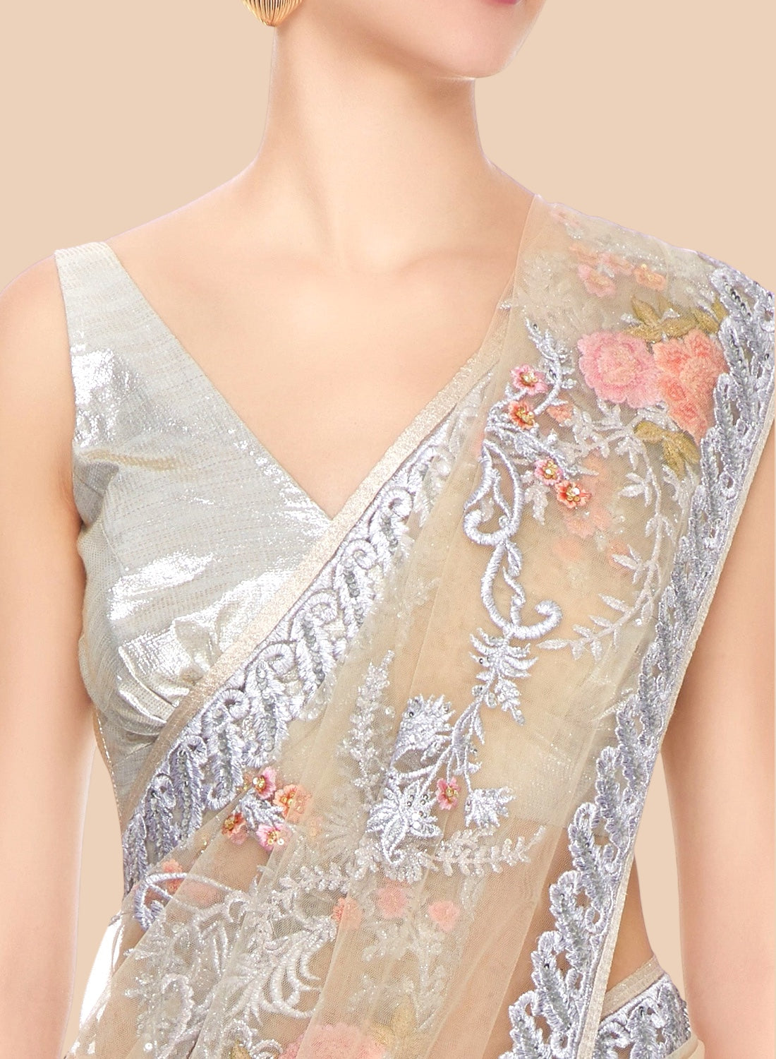 Saree with floral embroidery on a neutral background
