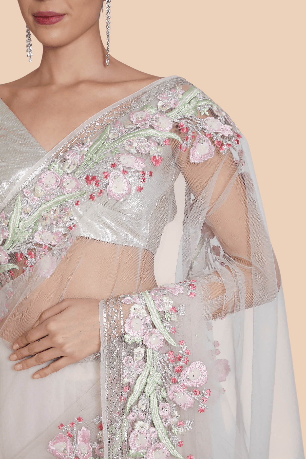 Close-up of floral resham thread and sequin border embroidery