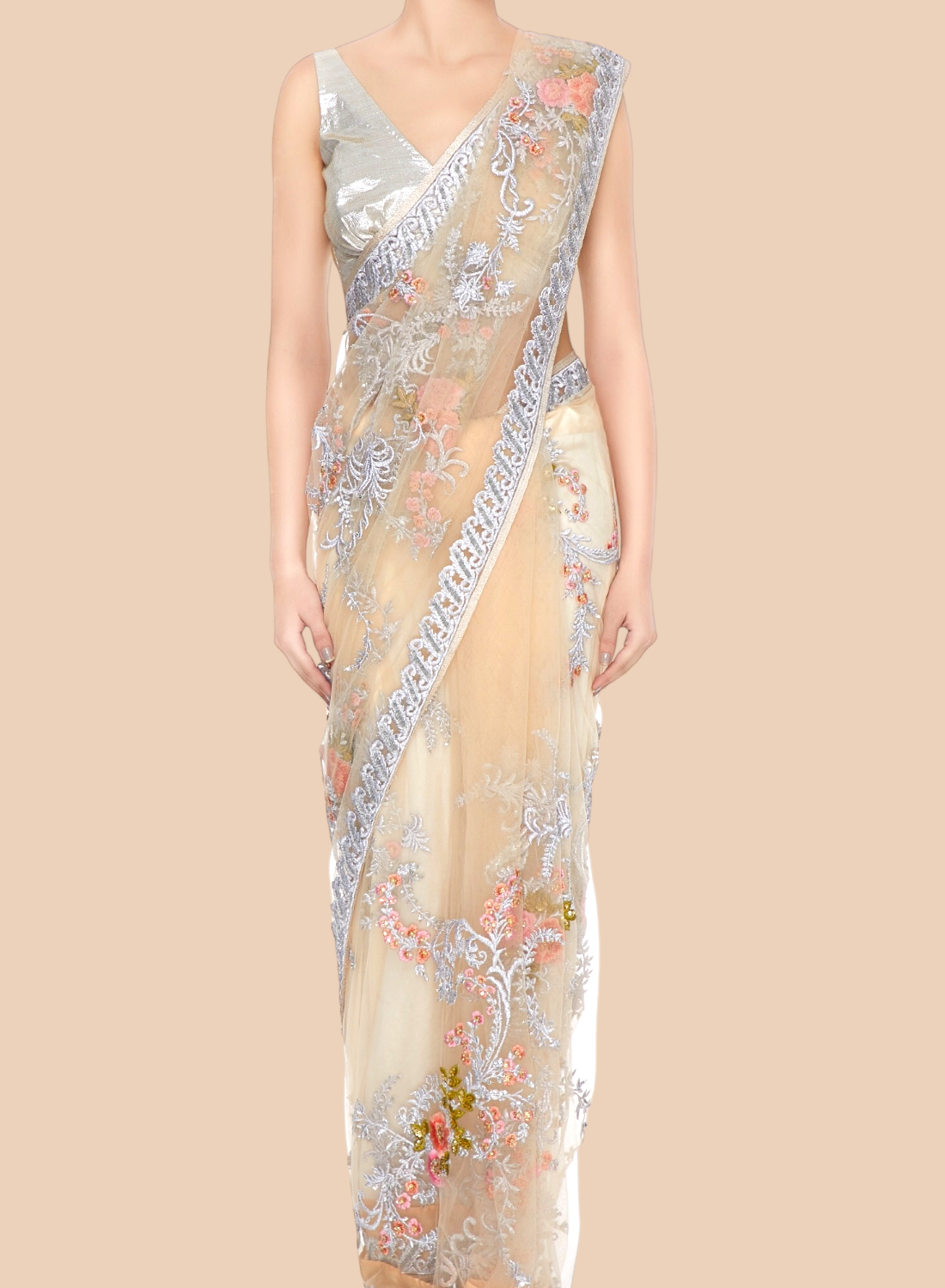 Beige saree with floral embroidery on a beige background
