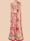 Traditional Indian outfit with floral patterns on a beige background
