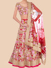 Traditional Indian outfit with floral patterns on a beige background