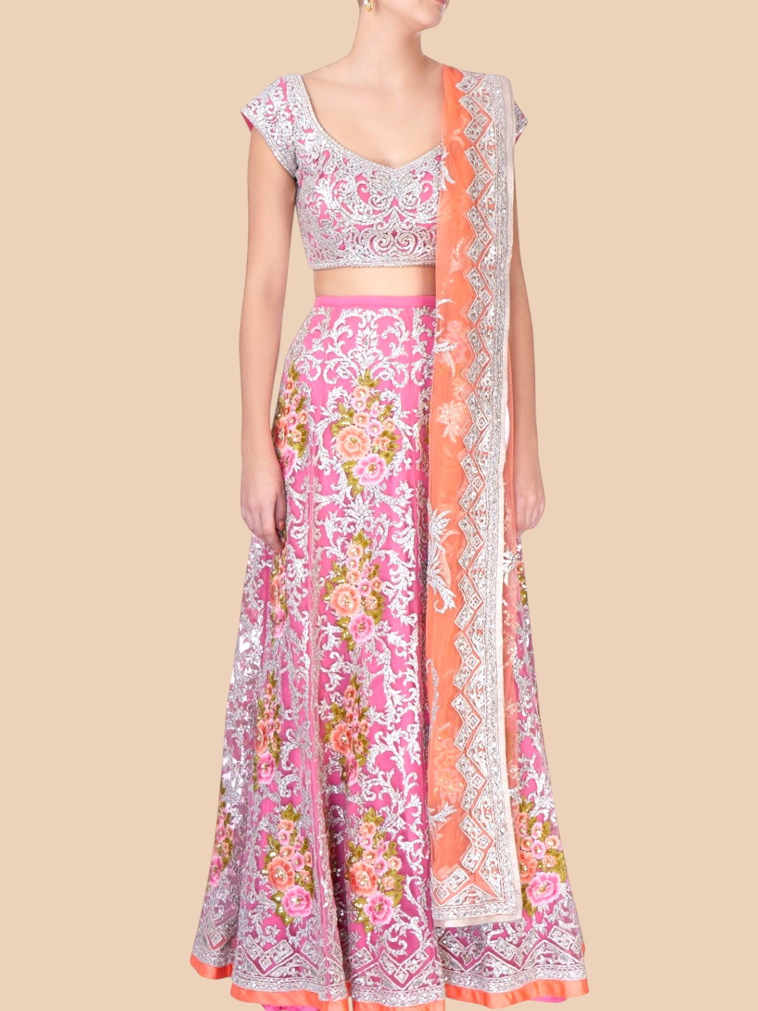 Traditional outfit with a floral pattern on a beige background