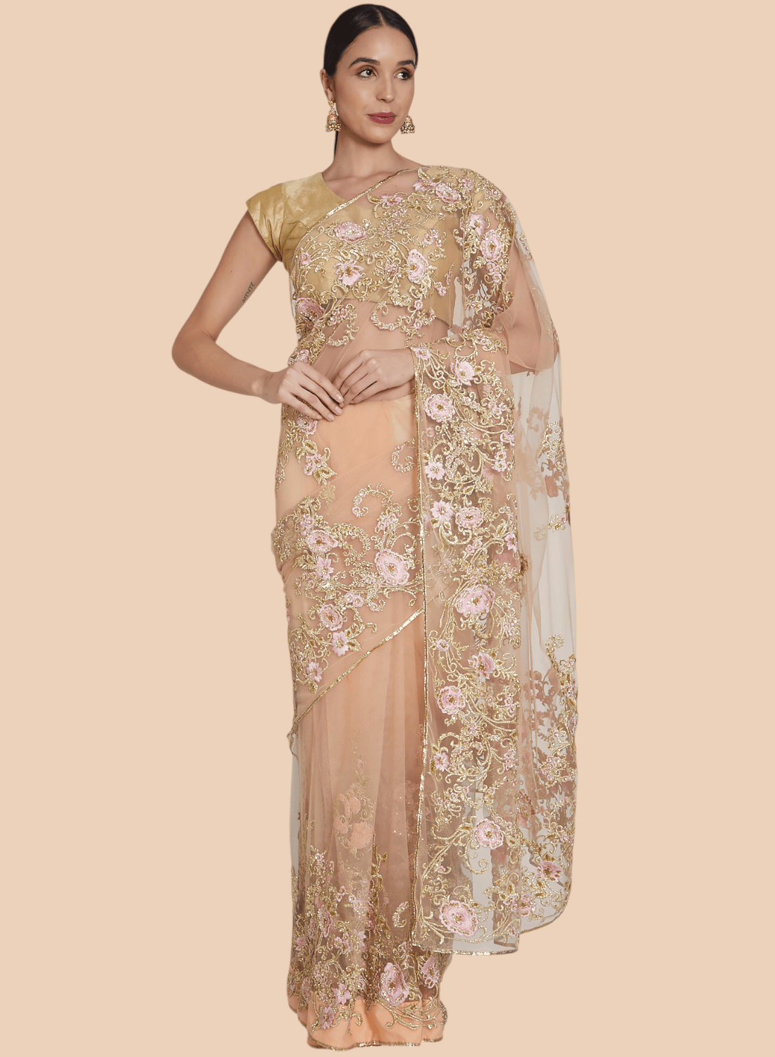 Front view of peach net sari with gold and floral 9-yard embroidered border