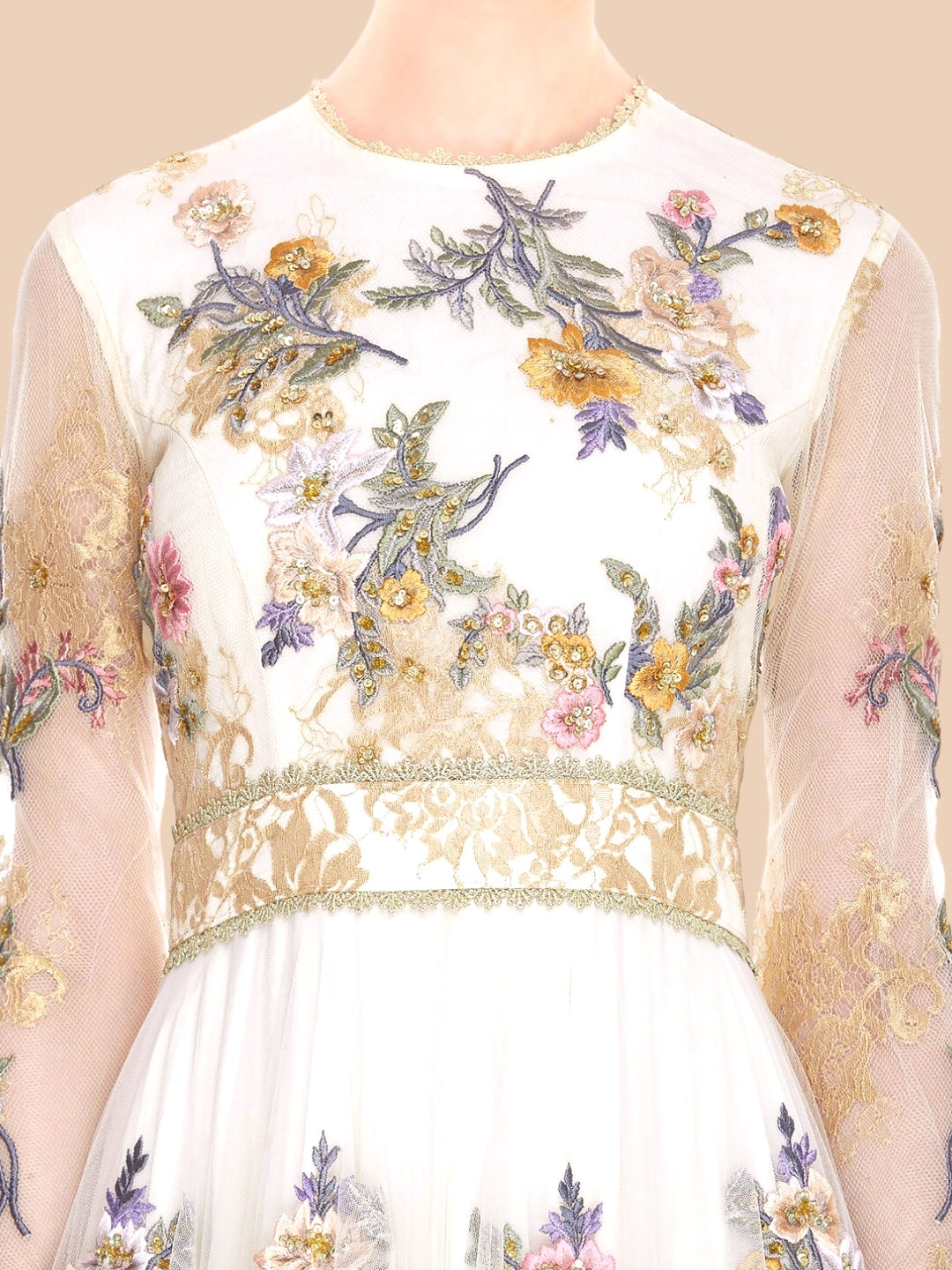  Ivory gown featuring floral embroidery and sheer sleeves, adorned with gold lace appliqué for a timeless elegance.