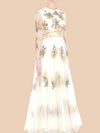  Ivory gown featuring floral embroidery and sheer sleeves, adorned with gold lace appliqué for a timeless elegance.