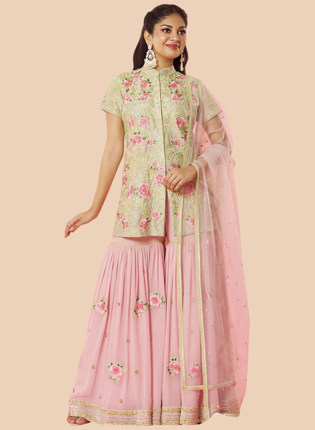  Stunning pink embroidered lehenga suit with a floral silk top, paired with a matching dupatta and georgette sharara.