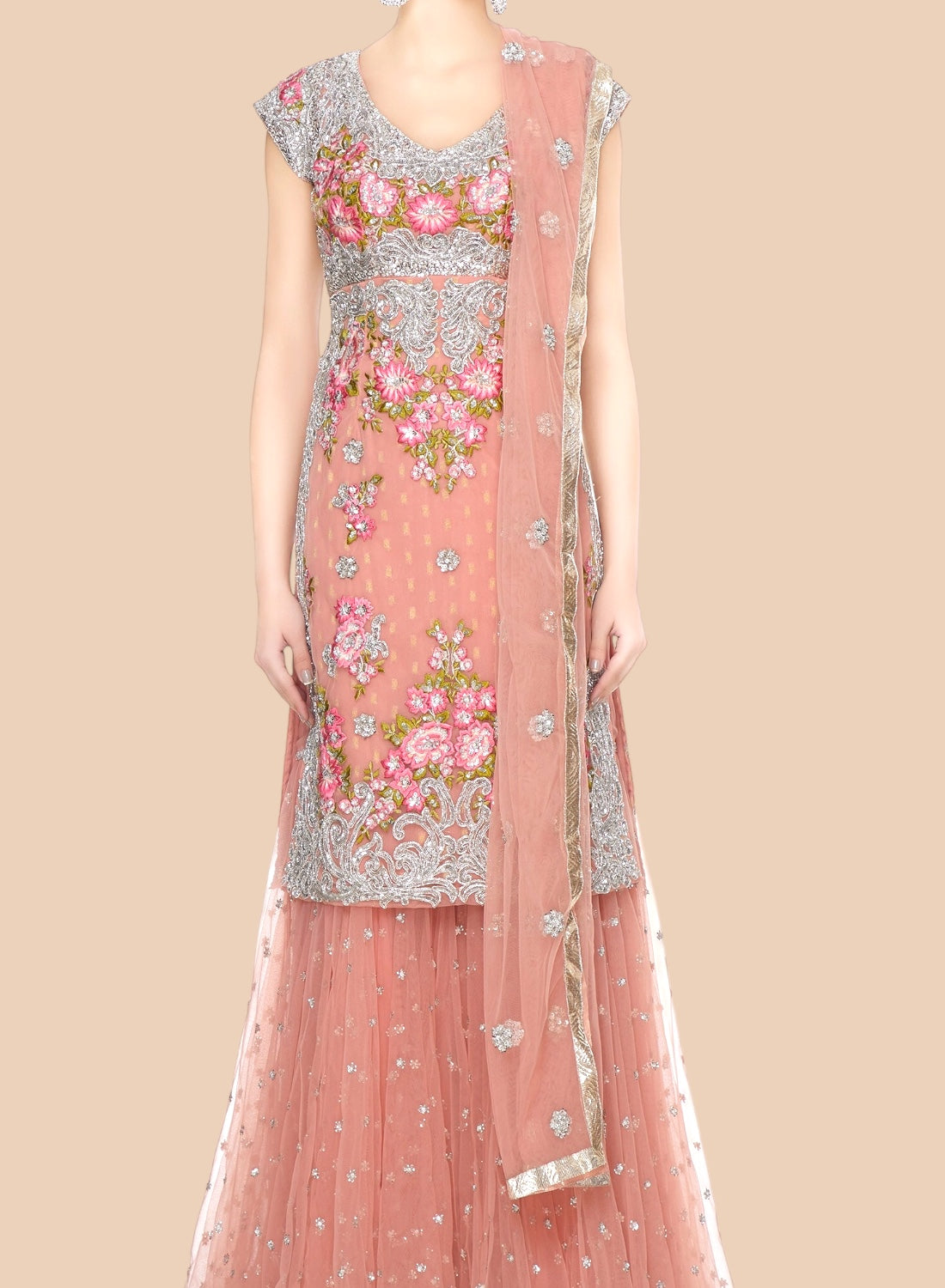 Beautiful rose net Sharara set adorned with floral embroidery and silver scrolls, paired with a delicate dupatta for elegance.