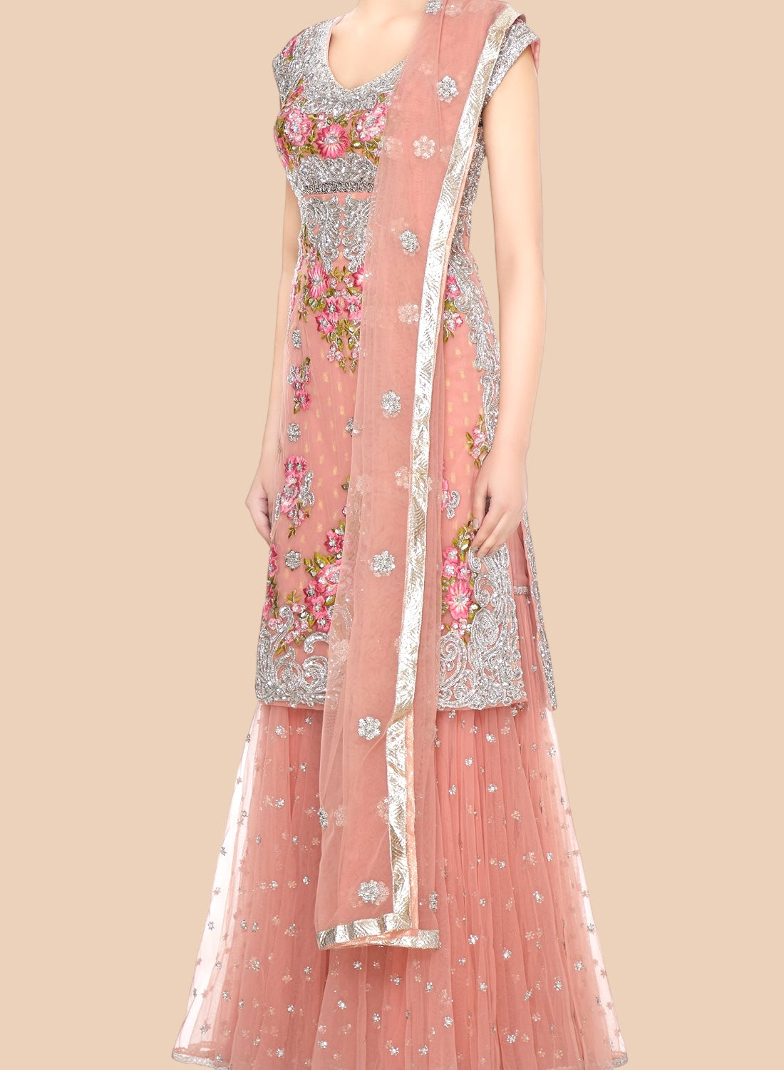Beautiful rose net Sharara set adorned with floral embroidery and silver scrolls, paired with a delicate dupatta for elegance.