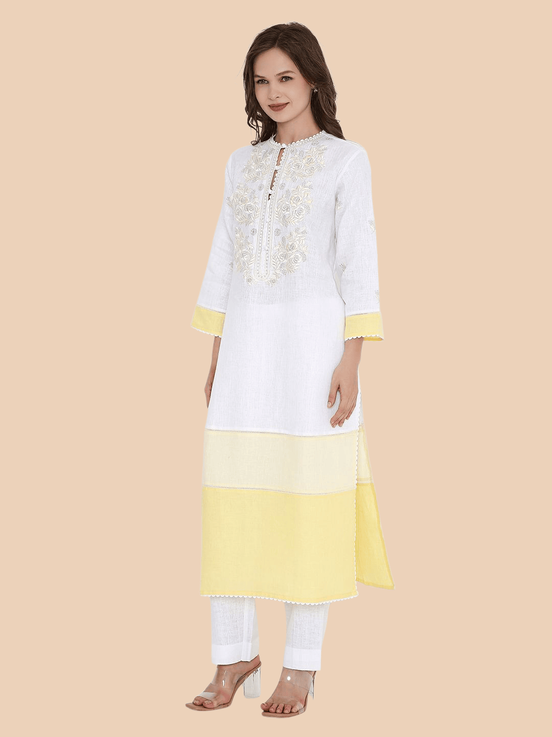 Side angle showing sleeve embroidery and tiered hem in contrast yellow