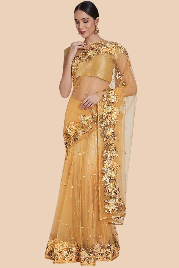 Front view of yellow net lehenga sari with floral embroidered border