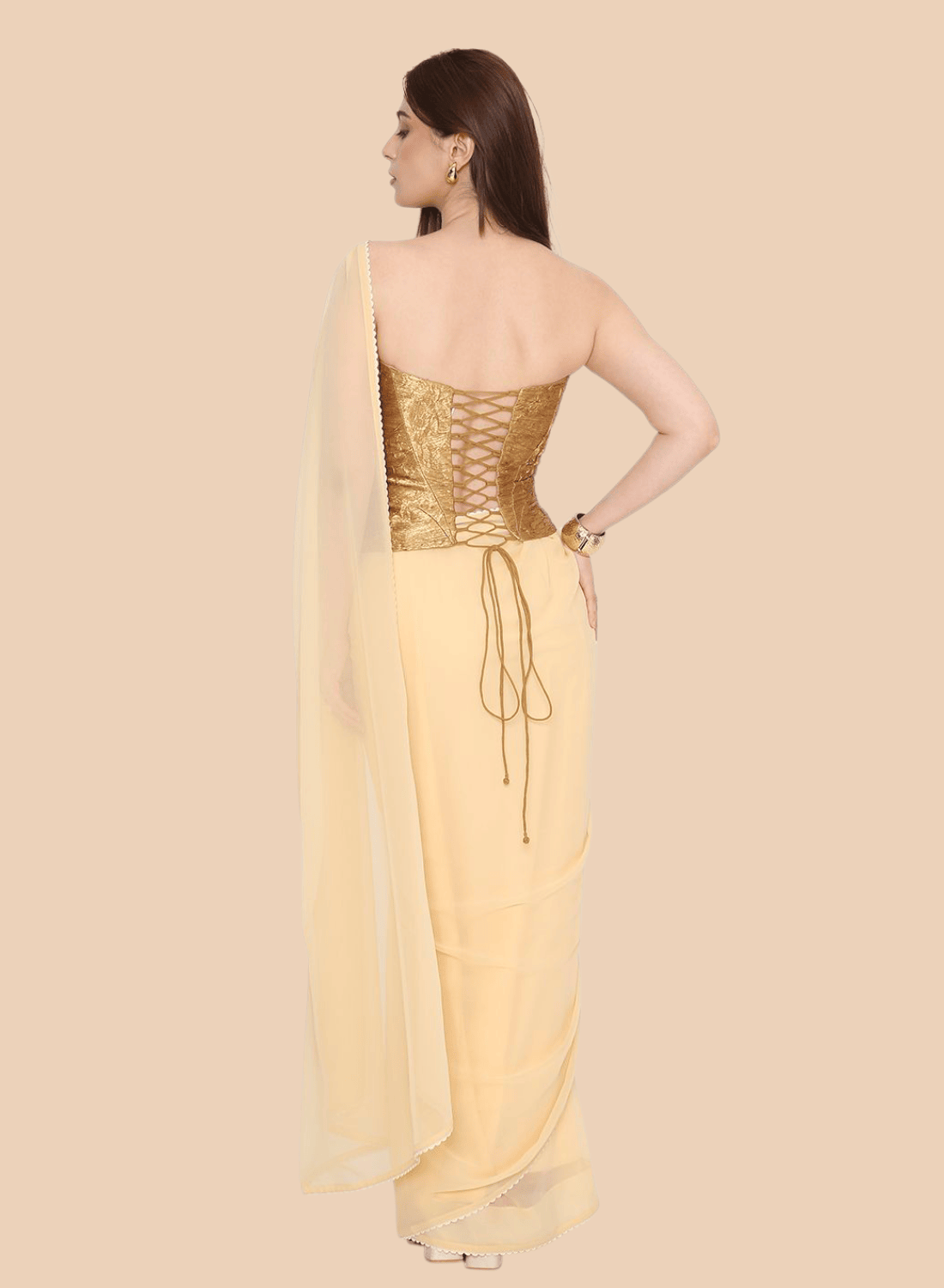 Back view of gold corset with tie-up adjustable strings and boned structure