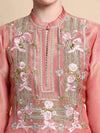 Close-up of floral Resham and zari embroidery on neckline of pink tissue kurta