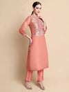Side view of embroidered pink tissue kurta showing elegant straight silhouette