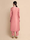 Back view of pink tissue silk kurta with dupion trousers