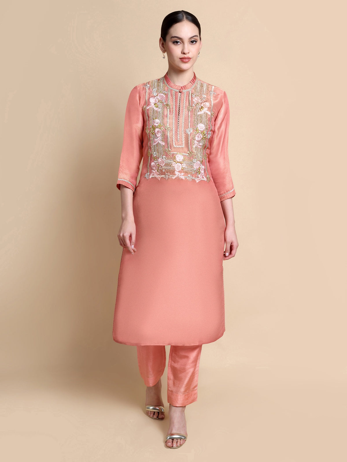 Front view of pink tissue silk kurta with floral embroidery at the neckline and Dupion trousers