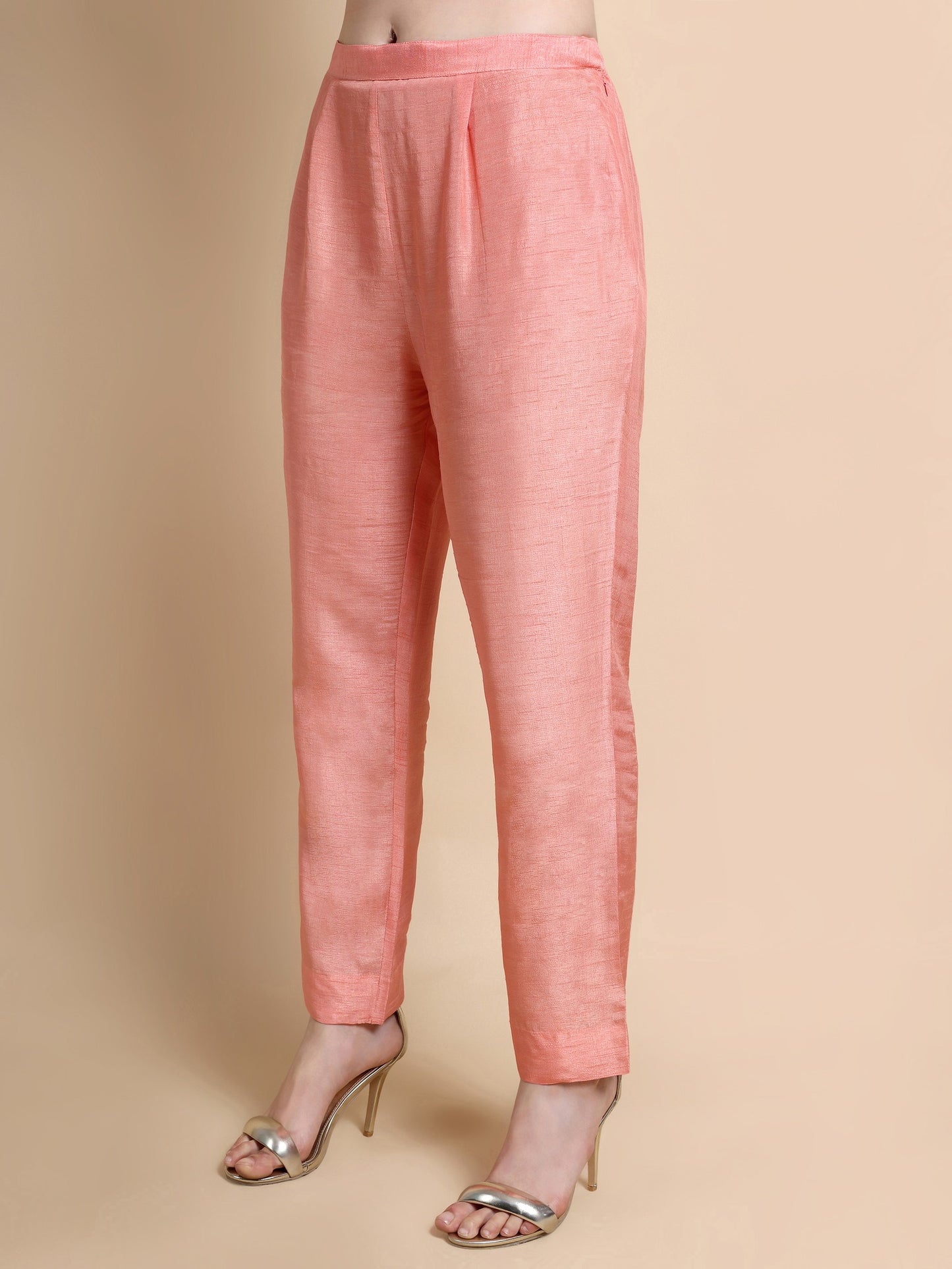 Side angle showing trouser of pink tissue kurta