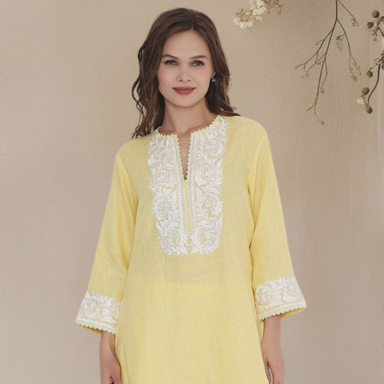 Model showing Yellow linen kurta with embroidery