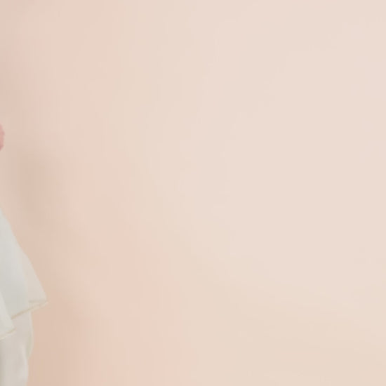 Elegant mint green kurta with gold embroidery, paired with an organza dupatta and satin trousers, showcasing refined style.